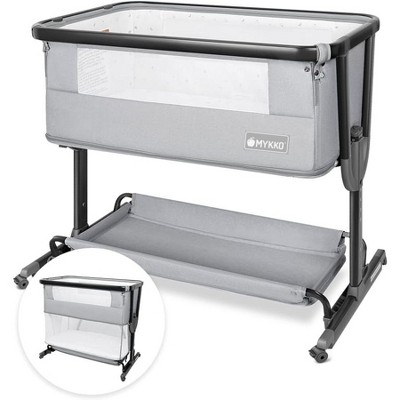 MYKKO 4 in 1 Baby Bassinet, Bedside Bassinet for Baby, Adjustable Bedside Sleeper with Soft Mattress & Storage Basket, Easy to Assemble, Black