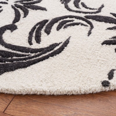 Ivory and Black Floral Hand-Tufted Wool Round Rug