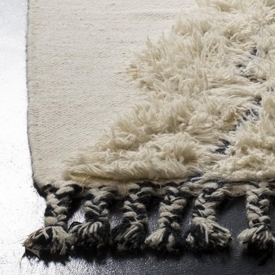 Kenya 9' x 12' Black and Ivory Wool Hand-Knotted Rug