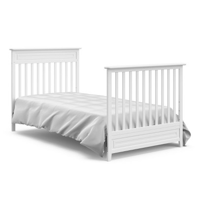White 4-in-1 Convertible Mini Crib with Mattress