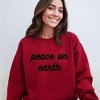 Simply Sage Market Women's Graphic Sweatshirt Peace On Earth Bold Cursive - 2 of 4