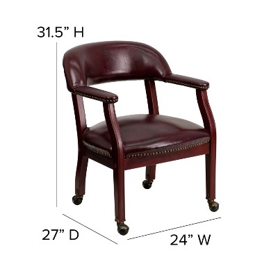 Elegant Oxblood Vinyl Conference Chair with Brass Nail Trim