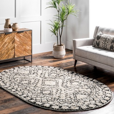 Off-White Synthetic Oval Shag Rug with Braided Tassels, 5' x 8'