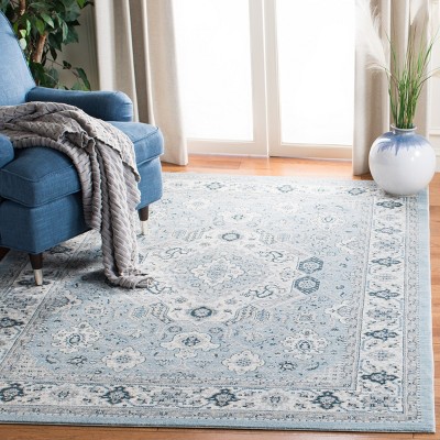 Isabella Blue and Cream Synthetic Area Rug 4' x 6'