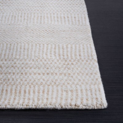 Beige and Ivory Hand Loomed Viscose 4' x 6' Area Rug