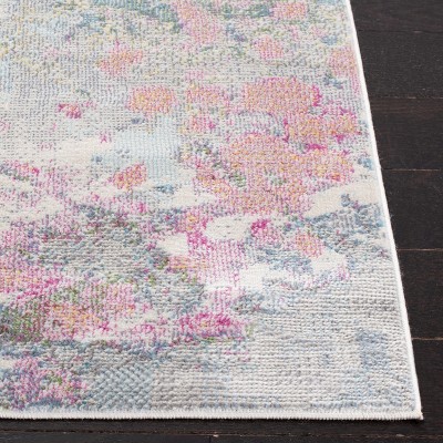 Ivory and Pink Abstract Synthetic Area Rug