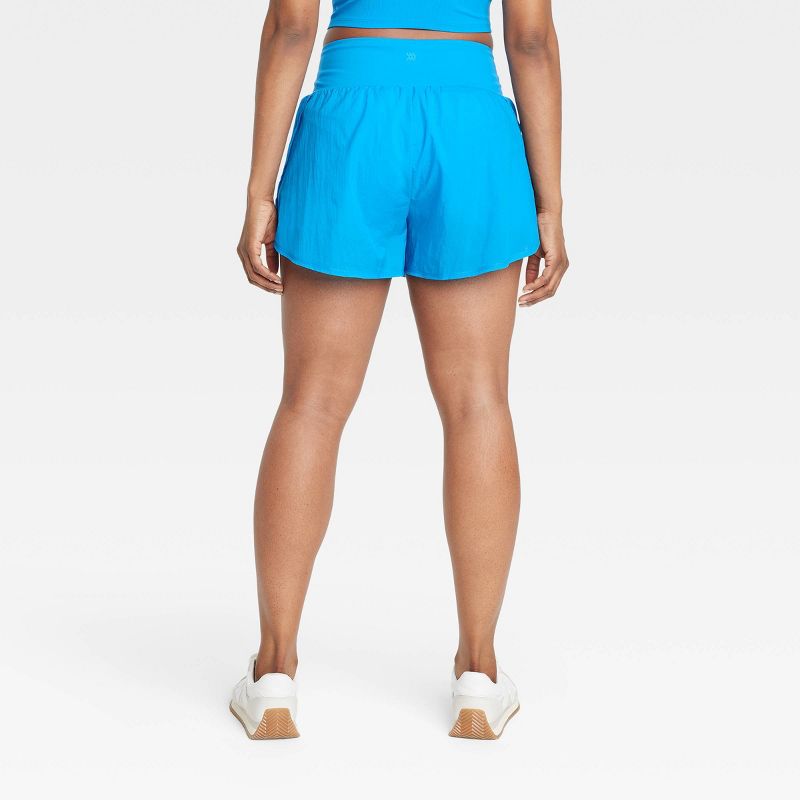 Women's Woven High-Rise 2-in-1 Run Shorts 3" - All In Motion™, 4 of 8