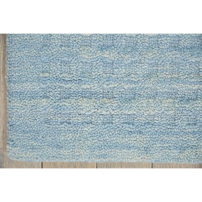 Handmade Sky Blue Wool 5' x 7' Rectangular Area Rug