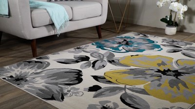 Cream Floral Synthetic 5' x 7' Reversible Area Rug