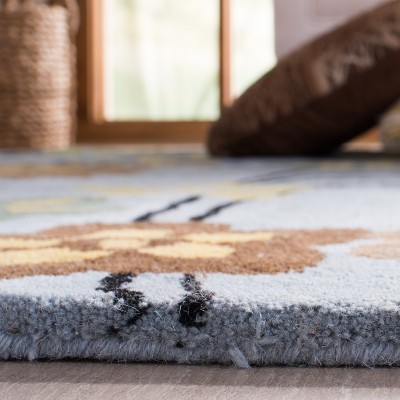 Handmade Blue and Multicolor Wool and Viscose Floral Area Rug