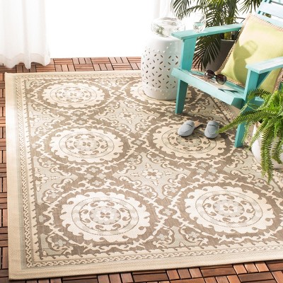 Ivory and Beige Rectangular Synthetic Indoor/Outdoor Area Rug