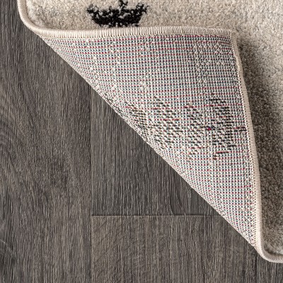 Zaina 8' x 10' Black and Cream Geometric Synthetic Area Rug