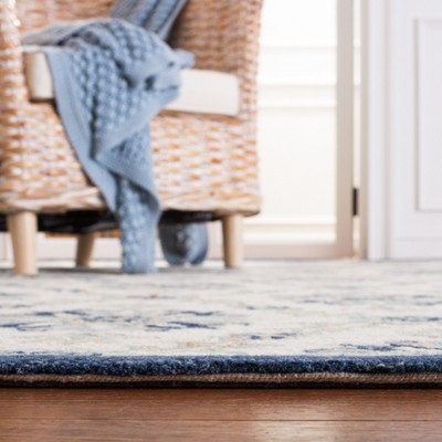 Ivory and Blue Floral Tufted Wool Rug 4' x 6'