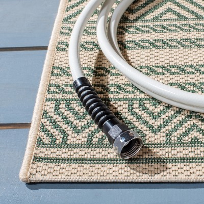 Beige and Dark Green 8' x 10' Stain-Resistant Synthetic Rug