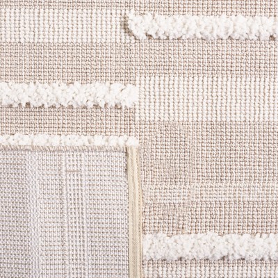 Ivory Geometric 9' x 12' Synthetic Easy Care Area Rug