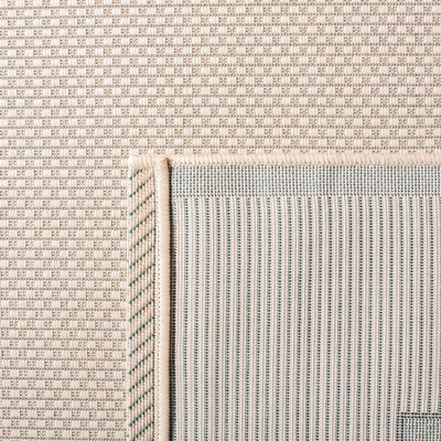 Beige and Dark Green Rectangular Synthetic Indoor/Outdoor Rug