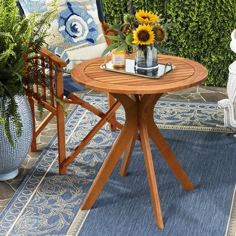 Round wooden garden discount table