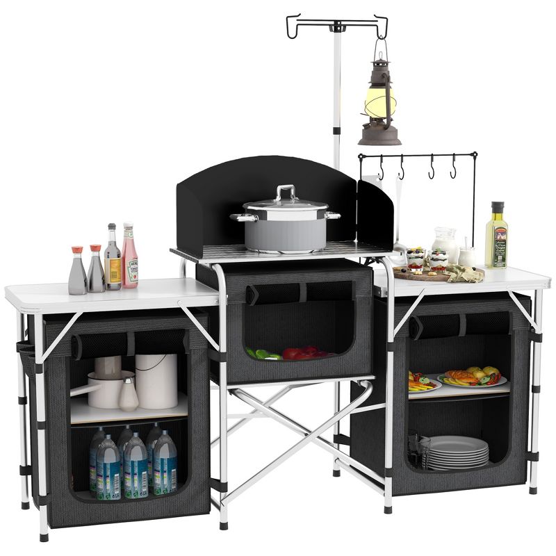 Outsunny Camping Kitchen Table, Portable Folding Camp Kitchen, Aluminum Cook Station with 3 Fabric Cupboards, Windshield, Carrying Bag, Black, 1 of 7