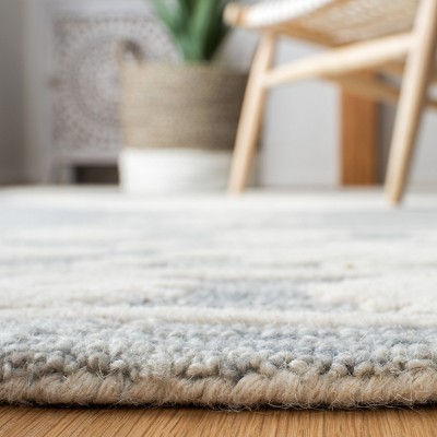 Ivory and Light Grey Handmade Wool Tufted 6' x 9' Area Rug