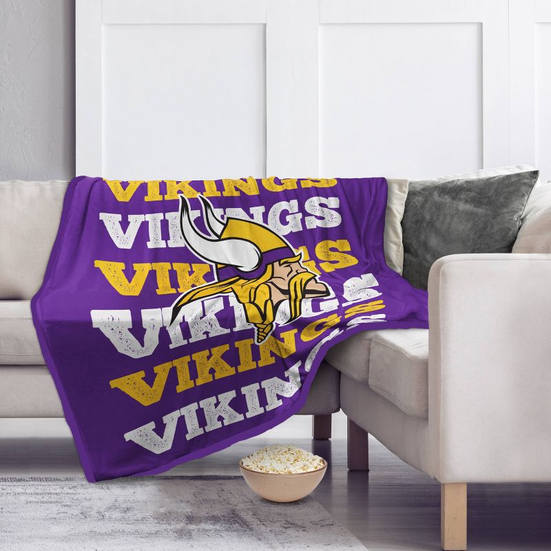 NFL Minnesota Vikings Repeat Refresh Wordmark Flannel Fleece Throw Blanket, 1 of 4