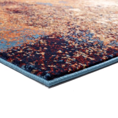 Blue and Beige Abstract 6' x 9' Synthetic Area Rug