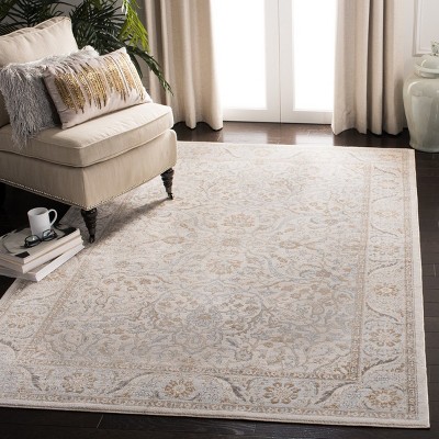 Isabella 6' x 9' Cream and Beige Synthetic Round Area Rug