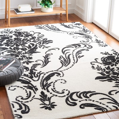 Ivory and Black Floral Tufted Wool 4' x 6' Rug