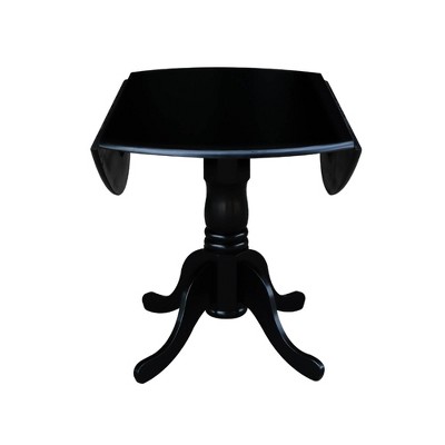 Casual Contemporary 42" Black Round Wood Extendable Dining Table