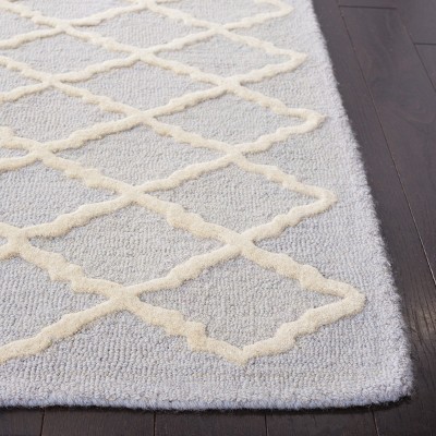 Light Blue and Ivory Hand-Tufted Wool 4' x 6' Area Rug