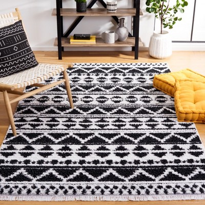Augustine Black and Ivory Flat Woven Synthetic Area Rug