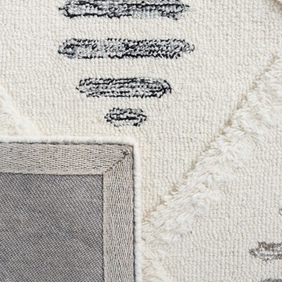 Ivory and Black Hand-Tufted Wool Shag Area Rug 4' x 6'