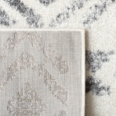 Ivory Geometric 5' x 7' Hand-Knotted Easy Care Area Rug