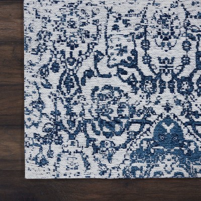 Ivory and Navy Medallion Synthetic 4' x 6' Area Rug