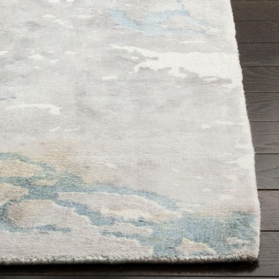 Turquoise and Ivory Hand-Knotted Wool and Viscose Area Rug, 6' x 9'
