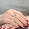 Guili Sterling Silver Rhodium-Plated Yellow Cushion Cubic Zirconia with Clear Round Accent, Twisted Design Ring, Elegant and Timeless, Sizes 6, 7, 8 - 3 of 3