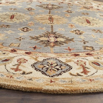 Antiquity Blue and Ivory Handmade Tufted Wool Round Rug