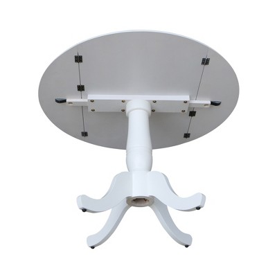 White Round Extendable Solid Wood Dining Table