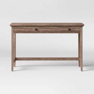 Carson wood writing desk deals with drawers