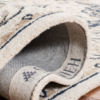 Handmade Ivory Wool Tufted Round Rug - 59 in Diameter