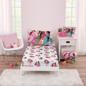 Disney Princesses Courage and Kindness Pink, Blue and White 2 Piece Toddler Sheet Set - Fitted Bottom Sheet and Reversible Pillowcase - 1 of 4