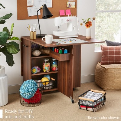 Sage Green Multipurpose Folding Table with Shelves and Wheels