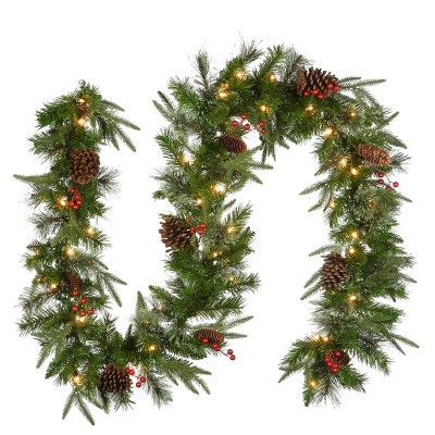 National Tree Company Pre-Lit 'Feel Real' Artificial Christmas Garland, Green, Colonial Fir, White Lights, With Pine Cones, Plug In, 9 Feet