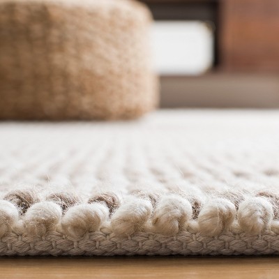 Ivory Handwoven Wool 3' x 5' Area Rug