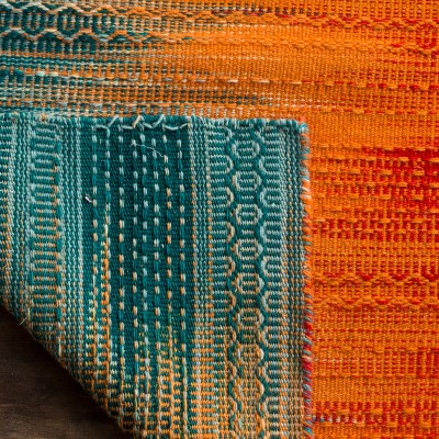 Handmade Teal and Red Wool 5' x 8' Flat Woven Area Rug