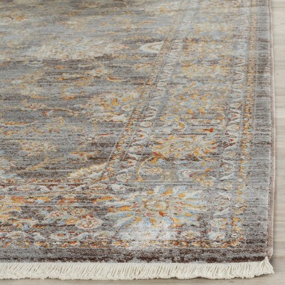 Vintage Light Brown and Multi Rectangular Area Rug 5' x 7'