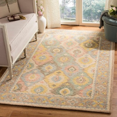 Ivory Floral Hand-Knotted Wool Area Rug, 5' x 8'