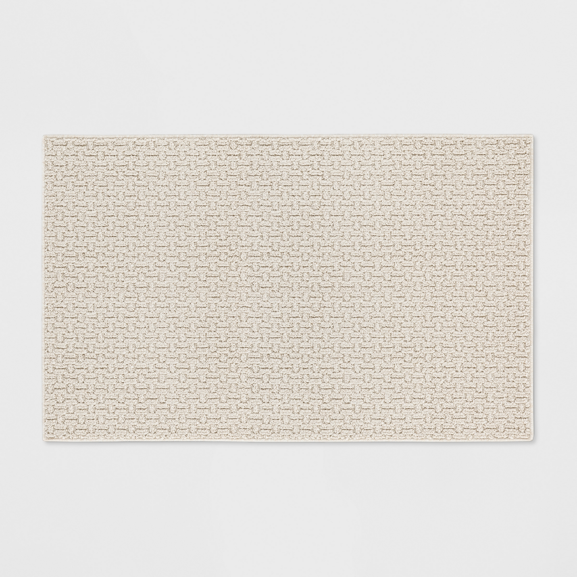 2'6"x3'10" Washable Solid Machine Tufted Accent Rug Tan - Threshold™
