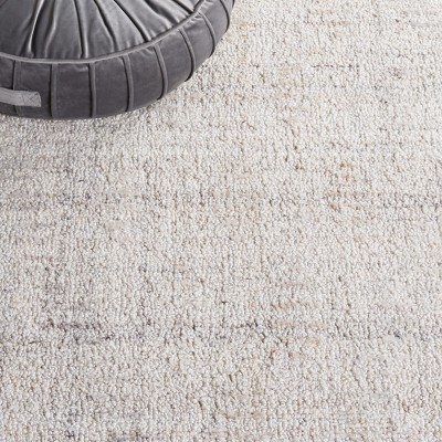Ivory Abstract Handmade Tufted Wool Area Rug