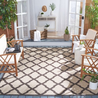 Cream and Brown 8' x 10' Stain-Resistant Synthetic Rug
