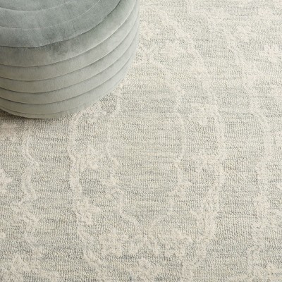 Handmade Light Blue Wool Tufted 6' x 9' Rectangular Rug